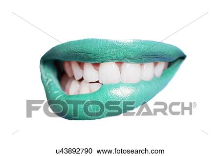 Close-up of teeth biting colored lip over white background View Large Photo Image Stock Image - Close-up of teeth biting colored lip over white background. Fotosearch