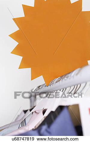 Stock Photo - Clothing on Sale. Fotosearch