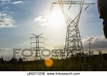 Electric power lines during summer View Large Photo Image Stock Photograph - Electric power lines during summer. Fotosearch