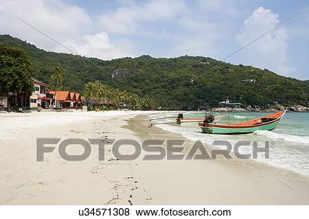 Fishing boats on beach, Koh Pha Ngan, Thailand View Large Photo Image Stock Photo - Fishing boats on beach, Koh Pha Ngan, Thailand. Fotosearch