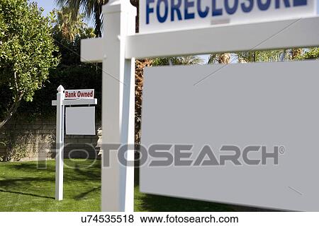 "Foreclosure" and "Bank Owned" signs in lawn View Large Photo Image Stock Photo - "Foreclosure" and "Bank Owned" signs in lawn. Fotosearch