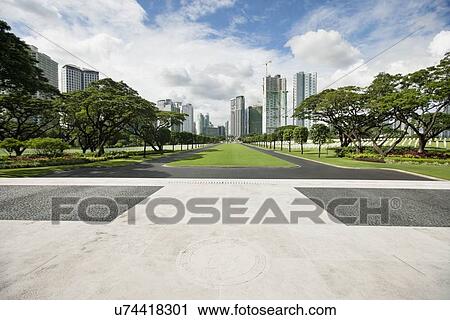 Manila American Cemetery and Memorial with cityscape, Manila, Philippines View Large Photo Image Stock Image - Manila American Cemetery and Memorial with cityscape, Manila, Philippines. Fotosearch