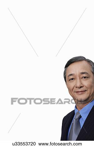 Portrait of confident businessman over white background View Large Photo Image Stock Image - Portrait of confident businessman over white background. Fotosearch