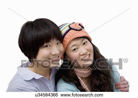 Portrait of happy brother and sister over white background View Large Photo Image Stock Photograph - Portrait of happy brother and sister over white background. Fotosearch