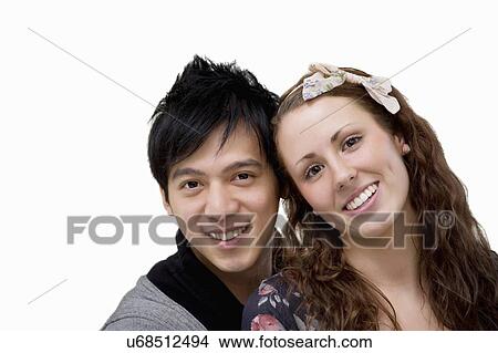 Portrait of happy loving couple over white background View Large Photo Image Picture - Portrait of happy loving couple over white background. Fotosearch