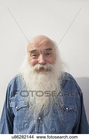 Portrait of senior man over gray background View Large Photo Image Picture - Portrait of senior man over gray background. Fotosearch