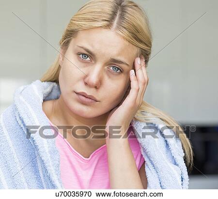 Portrait of young woman suffering from headache View Large Photo Image Stock Image - Portrait of young woman suffering from headache. Fotosearch
