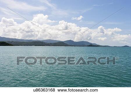 Seascape with mountains in the background, Koh Pha Ngan, Thailand View Large Photo Image Stock Photo - Seascape with mountains in the background, Koh Pha Ngan, Thailand. Fotosearch