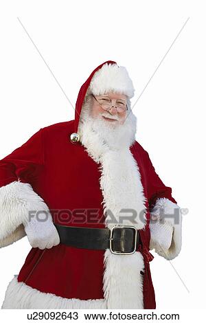 Stock Image - Smiling Santa Claus standing outside With Palm Trees. Fotosearch