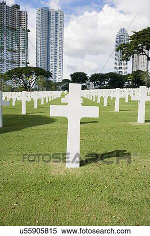 Stock Photography - The American Memorial Cemetery with buildings in background, Manila, Philippines. Fotosearch