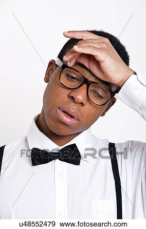 Stock Photo - Tired man over white background. Fotosearch