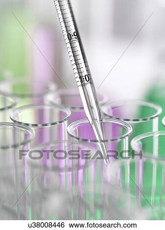 Stock Photograph - A graduated pipette being inserted into test tube. Fotosearch