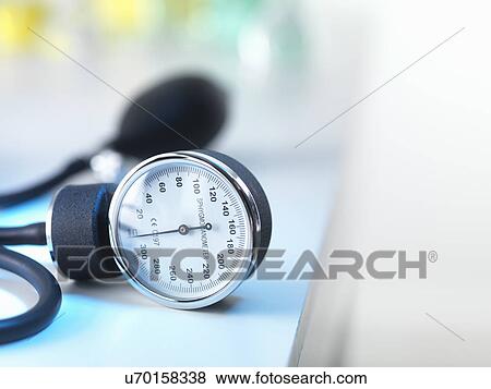 Blood pressure gauge in Doctors surgery View Large Photo Image Stock Photo - Blood pressure gauge in Doctors surgery. Fotosearch