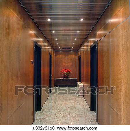 Brown panelling and doors in corridor View Large Photo Image Stock Image - Brown panelling and doors in corridor. Fotosearch