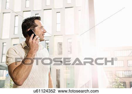 Stock Image - Businessman on telephone call. Fotosearch