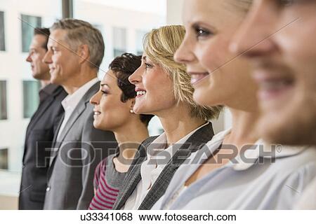 Businesspeople in a row View Large Photo Image Stock Photo - Businesspeople in a row. Fotosearch