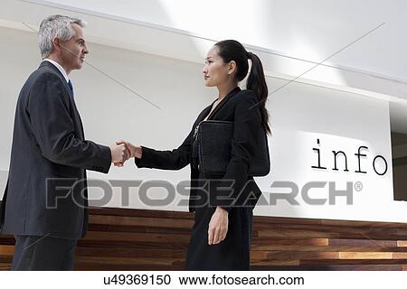 Businesspeople shaking hands View Large Photo Image Stock Image - Businesspeople shaking hands. Fotosearch