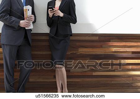 Businesspeople standing together View Large Photo Image Stock Photography - Businesspeople standing together. Fotosearch