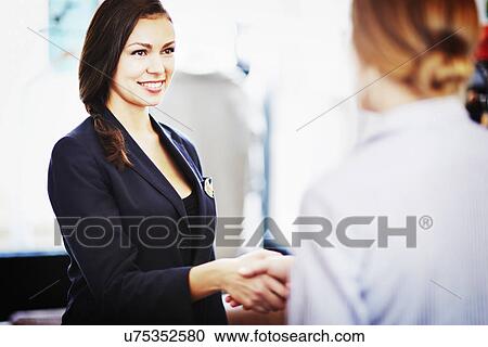 Businesswomen shaking hands View Large Photo Image Stock Image - Businesswomen shaking hands. Fotosearch