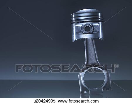 Stock Photography - Car engine piston on grey background. Fotosearch