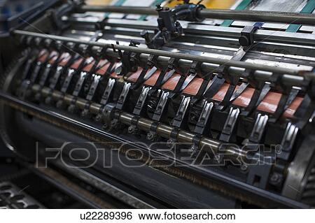 Close up of paper print machine in printing workshop View Large Photo Image Stock Photograph - Close up of paper print machine in printing workshop. Fotosearch