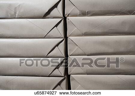 Close up of stacks of packaged paper in printing workshop View Large Photo Image Stock Photo - Close up of stacks of packaged paper in printing workshop. Fotosearch