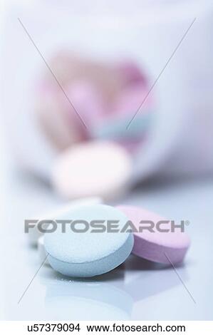 Picture - Close up studio shot of antacid chew tablets. Fotosearch