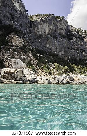 Coastal cliffs, Cala Goloritze, Sardinia, Italy View Large Photo Image Stock Photo - Coastal cliffs, Cala Goloritze, Sardinia, Italy. Fotosearch