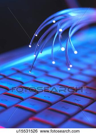 Computer key board with optical fibres which are used to carry images, or high volumes of data View Large Photo Image Stock Photograph - Computer key board with optical fibres which are used to carry images, or high volumes of data. Fotosearch