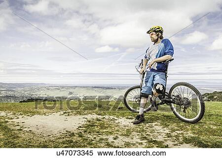Cyclist with bicycle, Monterey County Park, California, United States of America View Large Photo Image Stock Photography - Cyclist with bicycle, Monterey County Park, California, United States of America. Fotosearch