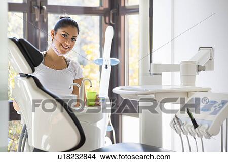 Dental nurse in dentists View Large Photo Image Picture - Dental nurse in dentists. Fotosearch