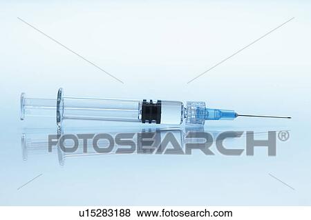 Disposable plastic medical syringe with attached hypodermic needle View Large Photo Image Stock Photo - Disposable plastic medical syringe with attached hypodermic needle. Fotosearch