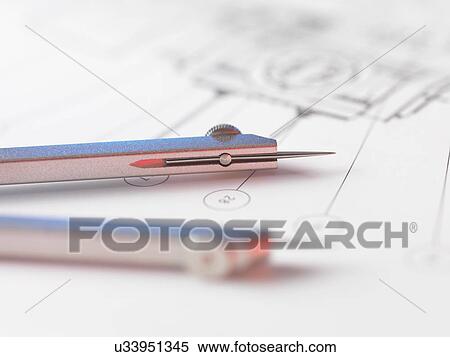 Dividers sitting on engineering drawing used in the measurement of design features View Large Photo Image Stock Photography - Dividers sitting on engineering drawing used in the measurement of design features. Fotosearch