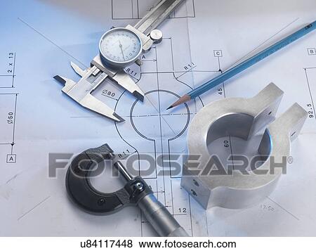 Stock Photo - Engineering drawing with product, micrometer and calipers. Fotosearch