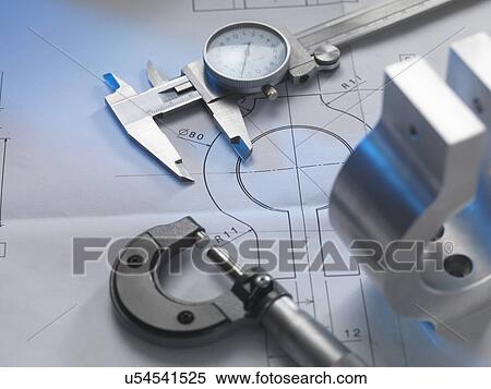 Stock Photography - Engineering drawing with product, micrometer and calipers. Fotosearch
