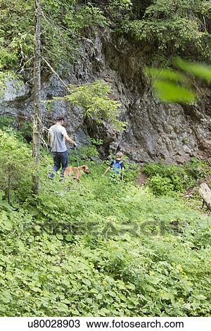 Father and son hiking on Kofel mountain, Bavaria, Germany View Large Photo Image Stock Image - Father and son hiking on Kofel mountain, Bavaria, Germany. Fotosearch