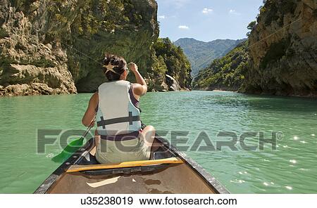Stock Photo - Female canoeist, Canyon du Verdon, Provence, France. Fotosearch