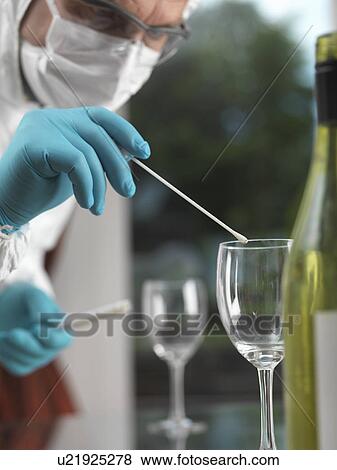 Forensic scientist using a DNA swab to take evidence from a glass at a scene of crime View Large Photo Image Stock Photo - Forensic scientist using a DNA swab to take evidence from a glass at a scene of crime. Fotosearch