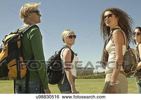 Four backpacker friends in park, Cape Town, South Africa View Large Photo Image Stock Photograph - Four backpacker friends in park, Cape Town, South Africa. Fotosearch