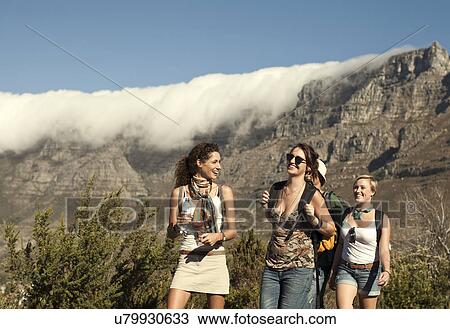 Friends backpacking, Table Mountain, Cape Town, South Africa View Large Photo Image Stock Image - Friends backpacking, Table Mountain, Cape Town, South Africa. Fotosearch