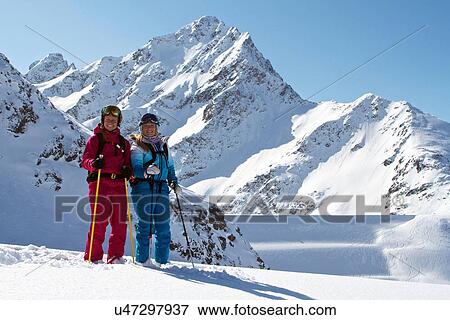 Stock Photo - Friends skiing in Kuhtai, Austria. Fotosearch