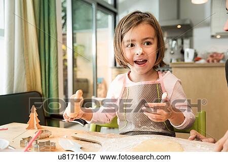 Girl with batter on nose View Large Photo Image Stock Photo - Girl with batter on nose. Fotosearch
