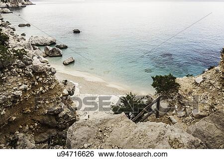 High angle view of coastal cliffs, Cala Goloritze, Sardinia, Italy View Large Photo Image Stock Photograph - High angle view of coastal cliffs, Cala Goloritze, Sardinia, Italy. Fotosearch
