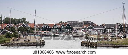 Houses, harbor and sailing boats, Marken, Netherlands View Large Photo Image Stock Photograph - Houses, harbor and sailing boats, Marken, Netherlands. Fotosearch