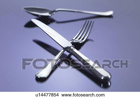 Knife, and fork in cross shape with spoon View Large Photo Image Picture - Knife, and fork in cross shape with spoon. Fotosearch