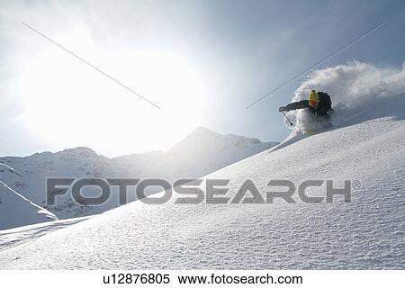 Stock Photography - Man skiing off piste in Kuhtai, Tirol, Austria. Fotosearch