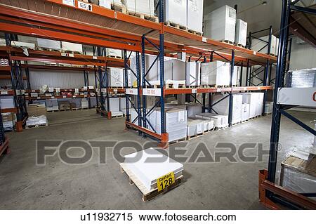 Stock Photography - Numbered paper package on pallet in printing warehouse. Fotosearch