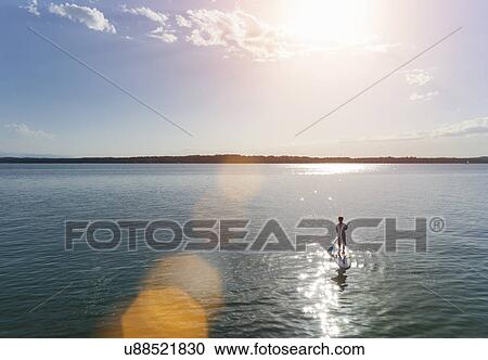 Paddling in Lake Starnberg, Bavaria, Germany View Large Photo Image Stock Image - Paddling in Lake Starnberg, Bavaria, Germany. Fotosearch