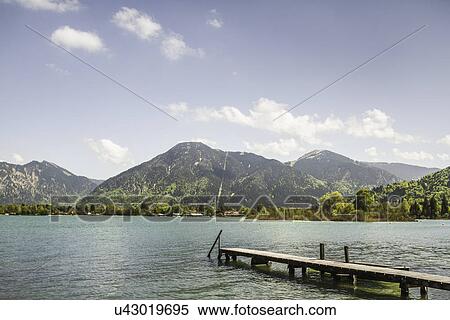 Stock Photography - Pier on Lake Tegernsee, Bavaria, Germany. Fotosearch
