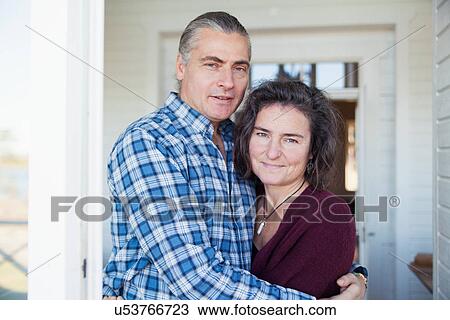 Portrait of mature couple enjoying vacation, Mariefred, Sweden View Large Photo Image Stock Image - Portrait of mature couple enjoying vacation, Mariefred, Sweden. Fotosearch